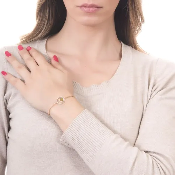 Bracciale con doppia base di zirconi e cabochon verde olivina gatteggiante     
