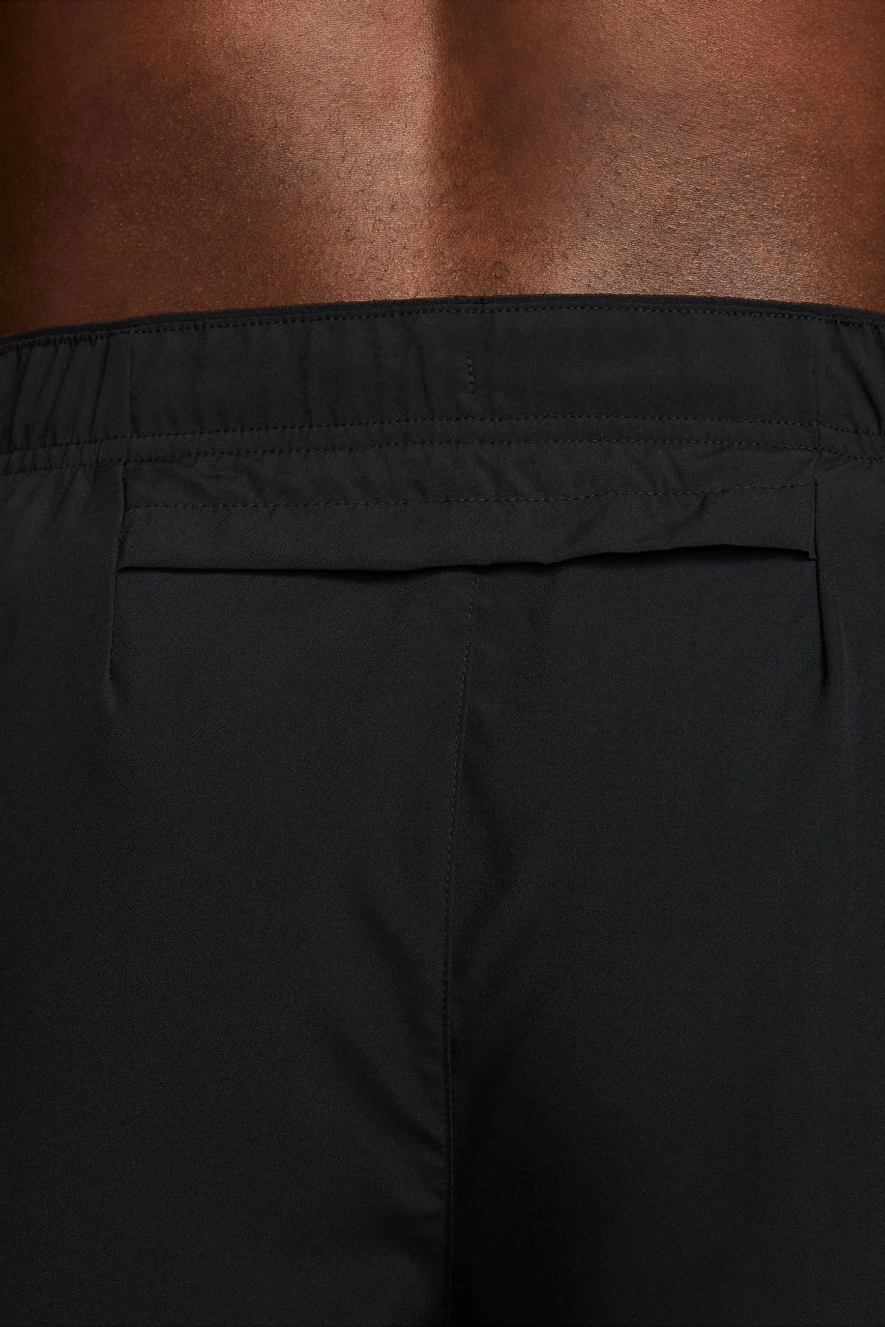 Nike - Dri-FIT Challenger - Shorts da running senza fodera    